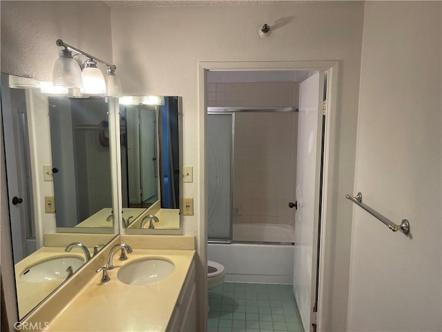 600 W 9th St Unit 902, Los Angeles, CA 90015 - full bath featuring tile patterned floors, vanity, and shower / bath combination with glass door