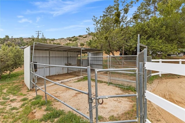 33435 Hubbard Rd, Acton, CA 93510 - view of outbuilding with an exterior structure and a carport