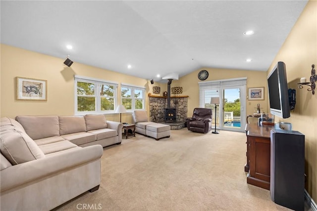 33435 Hubbard Rd, Acton, CA 93510 - living room featuring a wood stove, vaulted ceiling, light carpet, and recessed lighting