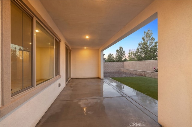view of patio with fence