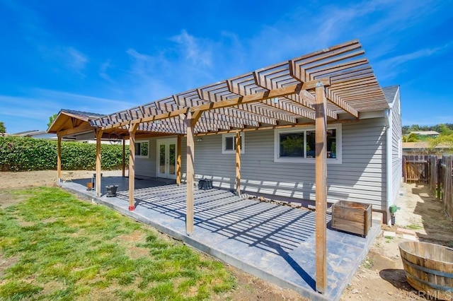 13522 Utopia Rd, Poway, CA 92064 - back of property featuring french doors, a patio area, a fenced backyard, and a pergola