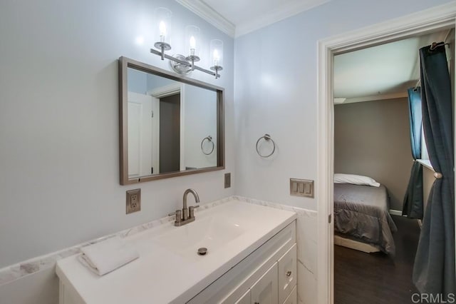 13522 Utopia Rd, Poway, CA 92064 - ensuite bathroom featuring ornamental molding, vanity, and wood finished floors