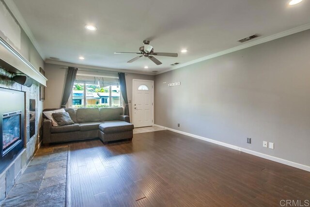 13522 Utopia Rd, Poway, CA 92064 - living room with a stone fireplace, ceiling fan, crown molding, recessed lighting, and wood finished floors
