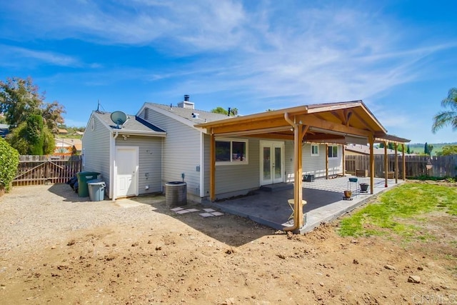 13522 Utopia Rd, Poway, CA 92064 - rear view of property featuring french doors, a patio, and a fenced backyard