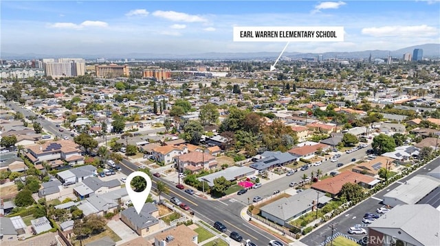 aerial view featuring a city view and a mountain view