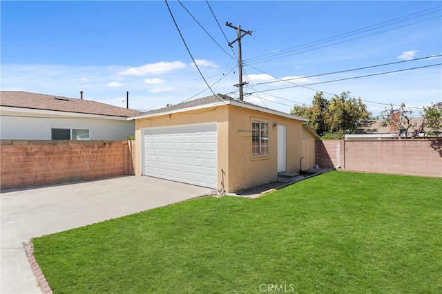 detached garage featuring fence