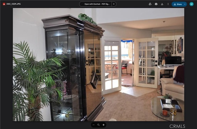 500 E Amado Rd Unit 420, Palm Springs, CA 92262 - doorway featuring french doors and carpet flooring