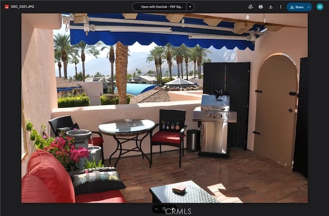 500 E Amado Rd Unit 420, Palm Springs, CA 92262 - view of patio with a grill