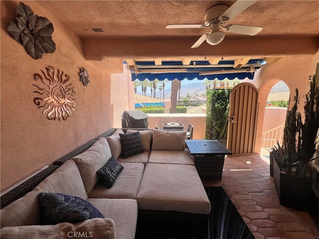 500 E Amado Rd Unit 420, Palm Springs, CA 92262 - view of patio featuring an outdoor living space and a ceiling fan