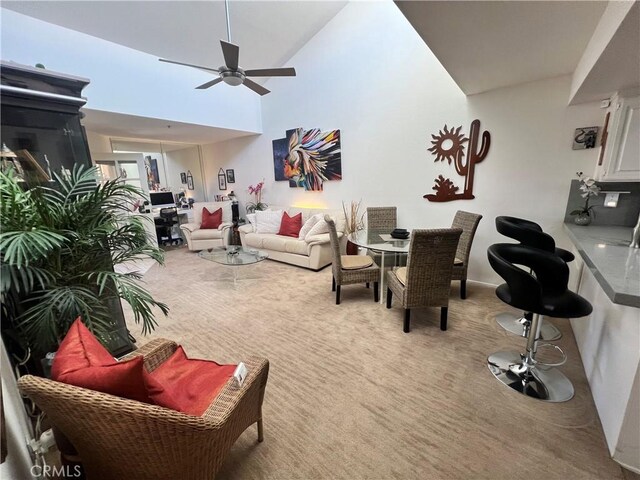 500 E Amado Rd Unit 420, Palm Springs, CA 92262 - carpeted living area featuring ceiling fan