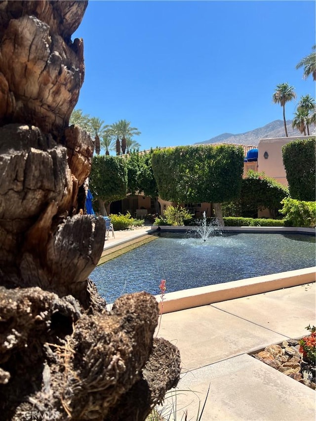 500 E Amado Rd Unit 420, Palm Springs, CA 92262 - view of swimming pool with a mountain view