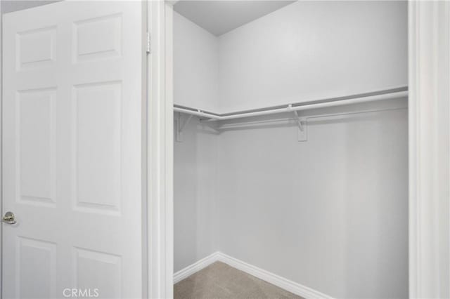 24909 Madison Ave Unit 1311, Murrieta, CA 92562 - spacious closet featuring carpet