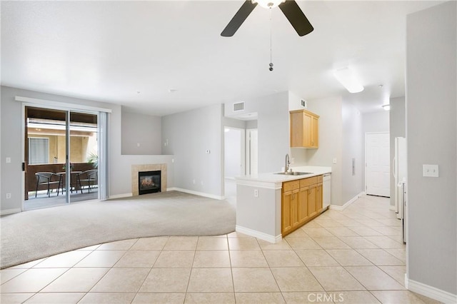 24909 Madison Ave Unit 1311, Murrieta, CA 92562 - kitchen with visible vents, a ceiling fan, white dishwasher, light colored carpet, and a sink