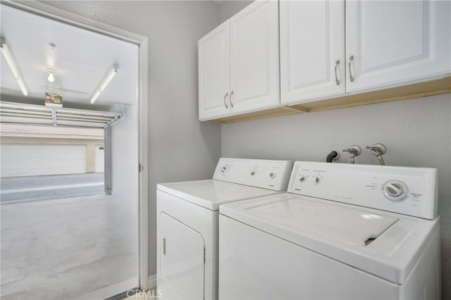 24909 Madison Ave Unit 1311, Murrieta, CA 92562 - laundry room featuring independent washer and dryer and cabinet space