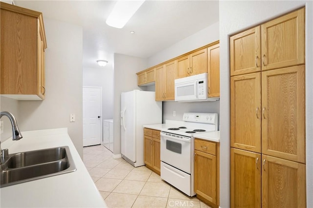 24909 Madison Ave Unit 1311, Murrieta, CA 92562 - kitchen with white appliances, light tile patterned flooring, a sink, and light countertops