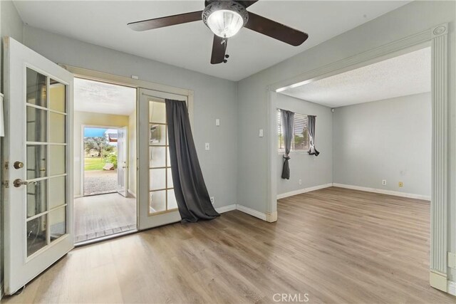 28755 Avenida Estrella, Menifee, CA 92587 - interior space with french doors, wood finished floors, and a wealth of natural light