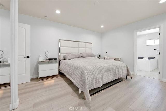 bedroom featuring light wood-style floors and recessed lighting
