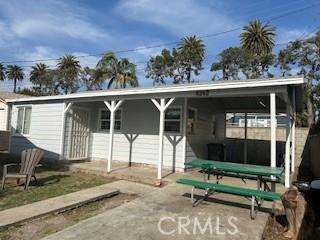 rear view of house with a patio