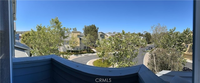 balcony featuring a residential view