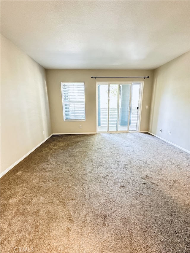 22 Platinum Cir, Ladera Ranch, CA 92694 - carpeted empty room featuring baseboards