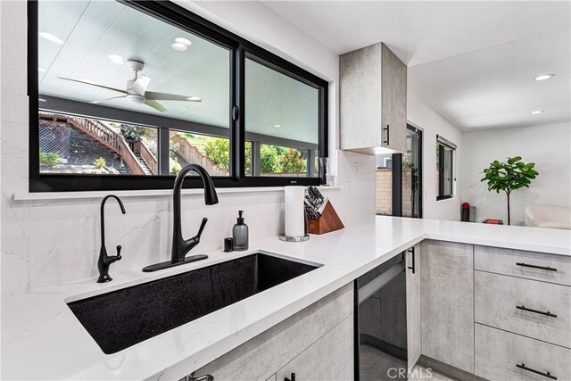 760 Featherwood Dr, Diamond Bar, CA 91765 - kitchen featuring a sink, a ceiling fan, modern cabinets, light stone counters, and recessed lighting