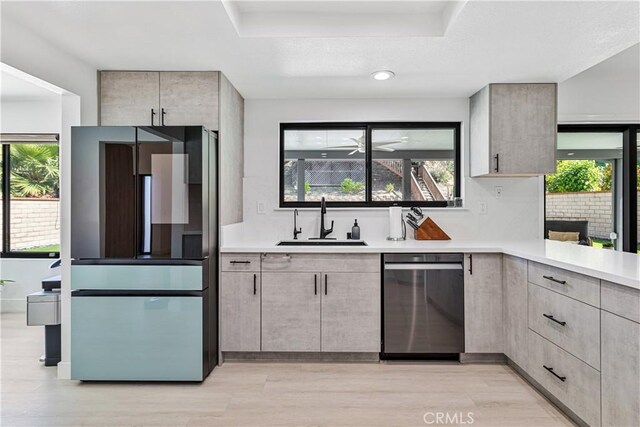 760 Featherwood Dr, Diamond Bar, CA 91765 - kitchen with appliances with stainless steel finishes, a sink, light countertops, light wood-type flooring, and recessed lighting