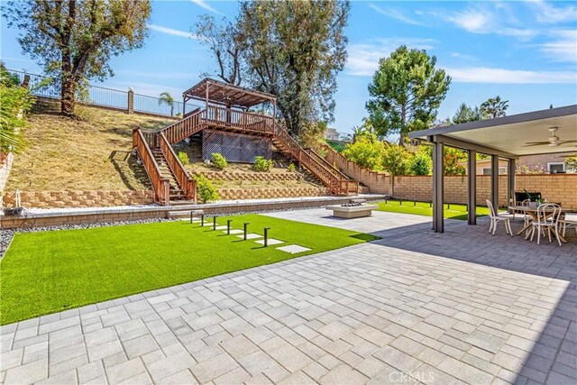 760 Featherwood Dr, Diamond Bar, CA 91765 - view of patio featuring a fire pit, a ceiling fan, stairs, a gazebo, and outdoor dining area