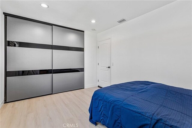 760 Featherwood Dr, Diamond Bar, CA 91765 - bedroom with light wood finished floors, baseboards, and recessed lighting