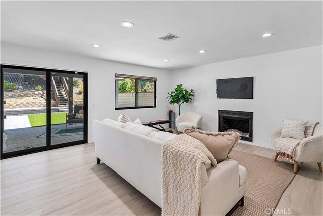 760 Featherwood Dr, Diamond Bar, CA 91765 - living room featuring a fireplace, light wood-style floors, and recessed lighting