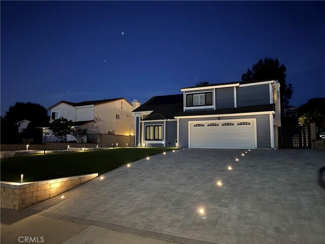 760 Featherwood Dr, Diamond Bar, CA 91765 - traditional home featuring a garage and decorative driveway