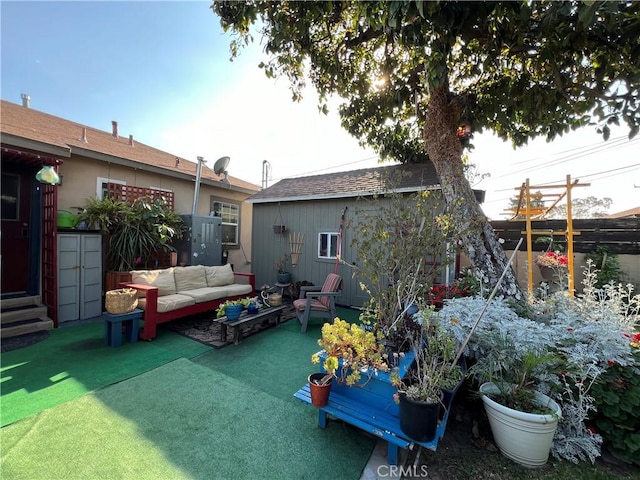 10709 Wheelock Cir, Whittier, CA 90606 - rear view of house featuring an outdoor hangout area and a fenced backyard
