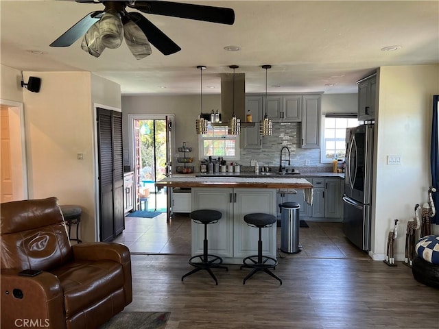 10709 Wheelock Cir, Whittier, CA 90606 - kitchen featuring smart refrigerator, a kitchen breakfast bar, a wealth of natural light, and a sink