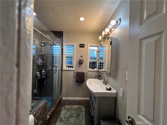 10709 Wheelock Cir, Whittier, CA 90606 - bathroom with vanity, tile patterned floors, recessed lighting, baseboards, and a shower stall