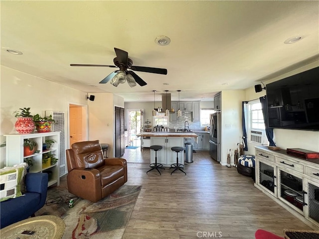 10709 Wheelock Cir, Whittier, CA 90606 - living room featuring recessed lighting, ceiling fan, and dark wood-style floors