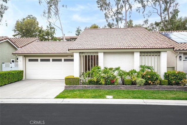 28143 Espinoza, Mission Viejo, CA 92692 - view of front of home featuring a garage, stucco siding, driveway, and a tiled roof