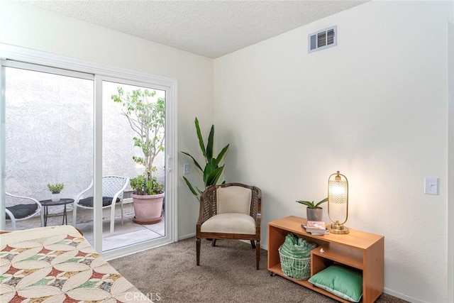 28143 Espinoza, Mission Viejo, CA 92692 - sitting room featuring carpet flooring, a textured ceiling, and visible vents