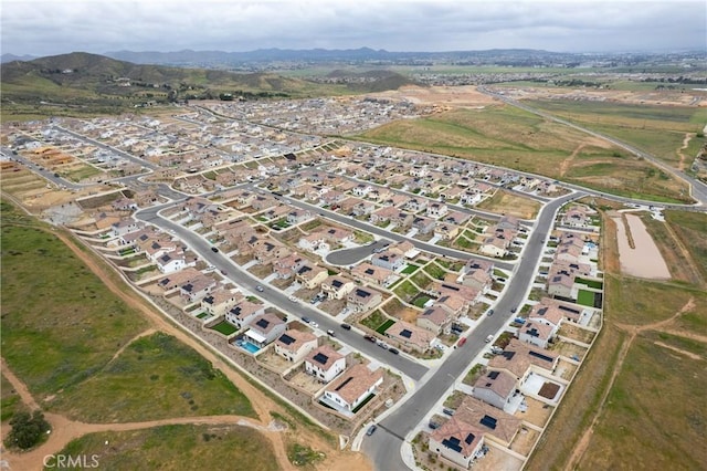 aerial view with a mountain view and a residential view