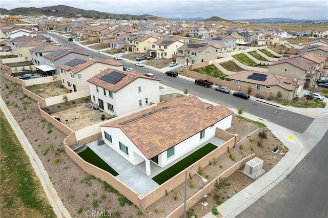 bird's eye view featuring a mountain view and a residential view