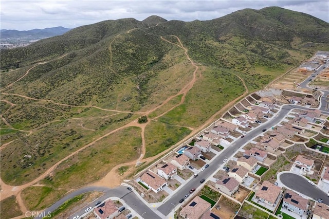 drone / aerial view featuring a mountain view
