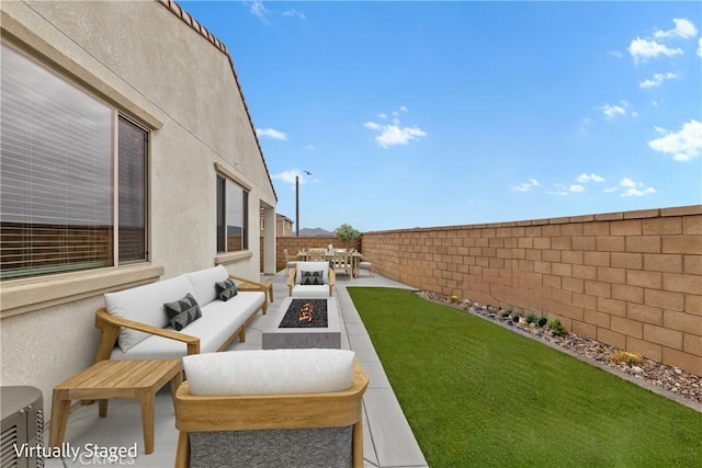 25441 Luna Peak Rd, Menifee, CA 92586 - fenced backyard with an outdoor living space with a fire pit and a patio area