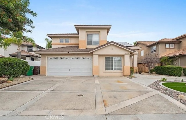 39675 Via Las Palmas, Murrieta, CA 92563 - traditional-style home featuring fence, stucco siding, concrete driveway, and a garage