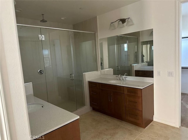 164 Newall, Irvine, CA 92618 - full bathroom with a stall shower, two vanities, and tile patterned flooring