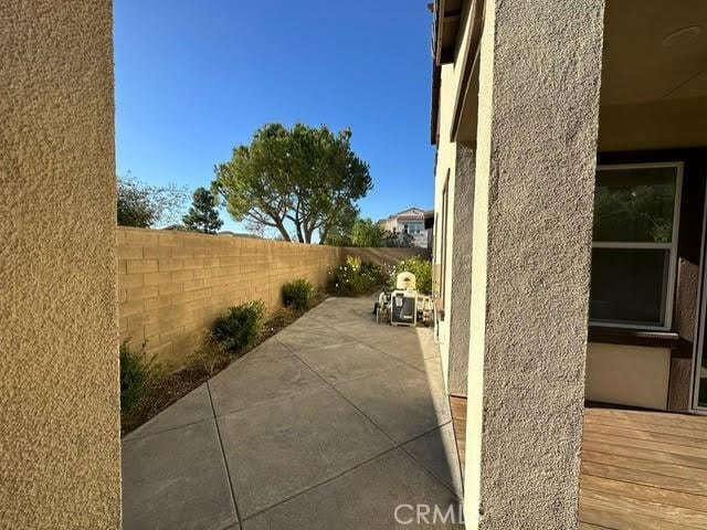 164 Newall, Irvine, CA 92618 - fenced backyard featuring a patio and area for grilling