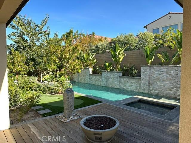 164 Newall, Irvine, CA 92618 - wooden terrace featuring an in-ground hot tub
