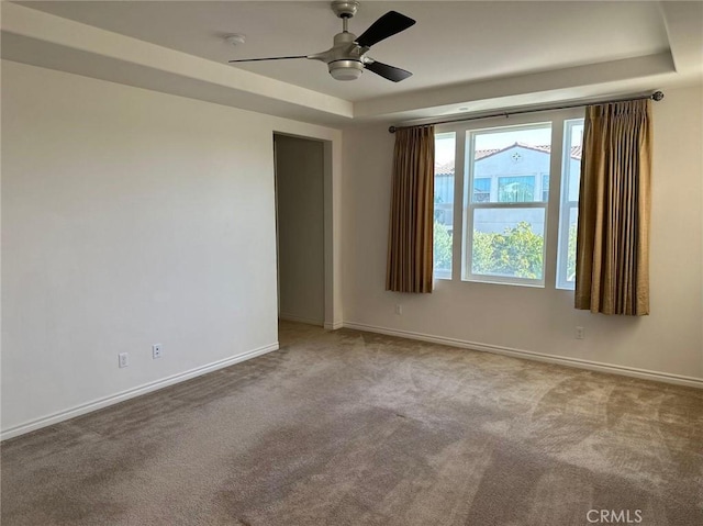164 Newall, Irvine, CA 92618 - unfurnished room featuring carpet, a ceiling fan, a raised ceiling, and a smoke detector