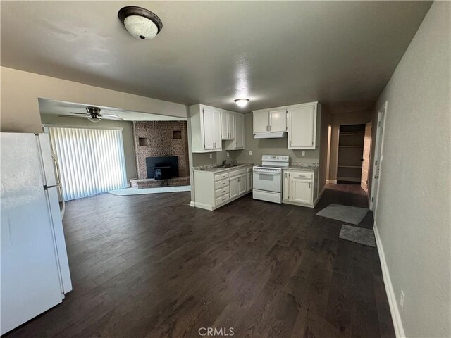3723 Buckeye St, Clearlake, CA 95422 - kitchen with baseboards, open floor plan, ceiling fan, and white appliances