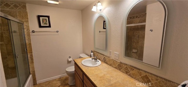 1929 Lebec Oaks Dr, Lebec, CA 93243 - bathroom with toilet, vanity, tiled shower / bath combo, and baseboards