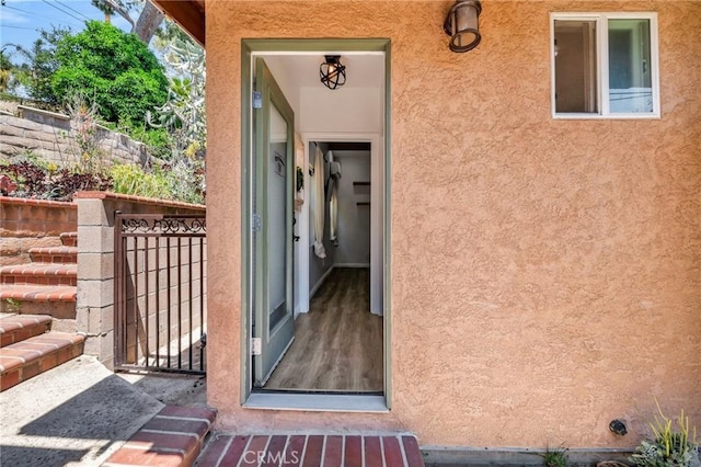 1341 E Harvest Moon St, West Covina, CA 91792 - property entrance featuring stucco siding