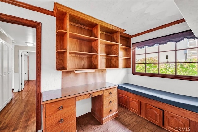 1341 E Harvest Moon St, West Covina, CA 91792 - unfurnished office with crown molding, built in study area, and dark wood-style flooring