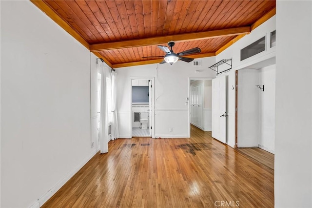 1341 E Harvest Moon St, West Covina, CA 91792 - unfurnished bedroom with wooden ceiling with exposed beams, light wood-style floors, and baseboards